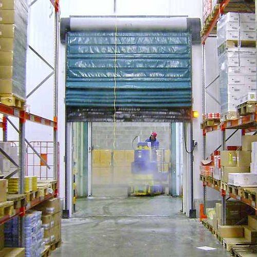 Porte industrielle pliante - NERGECO - en composite / en PVC / automatique