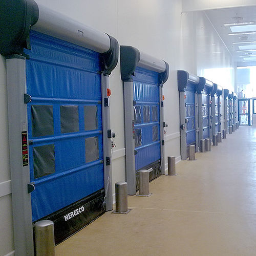 Porte industrielle pliante - NERGECO R LABO 5 - NERGECO - en composite / en PVC / automatique