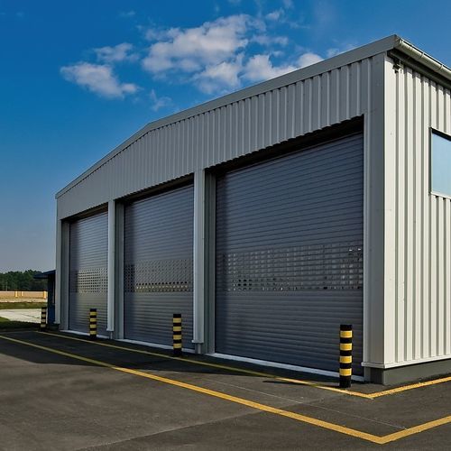 Porte industrielle enroulable - BR-100  - WISNIOWSKI - en aluminium / automatique / à isolation thermique