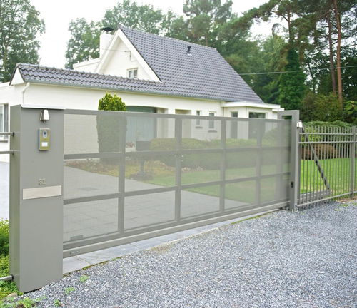 Portail coulissant - MODERN - WISNIOWSKI - en acier galvanisé / à lames / à barreaux