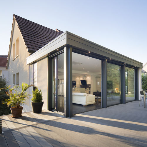 Véranda en verre - KAJOLE - KAWNEER - en aluminium / professionnelle / pour piscine