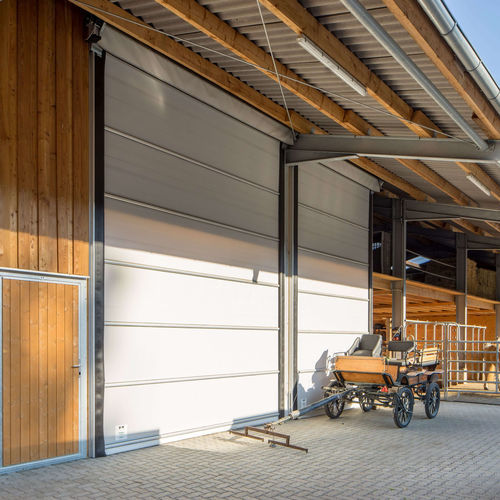 Porte industrielle sectionnelle - Lubratec® Stabitor - Huesker - en caoutchouc / en aluminium / de sécurité