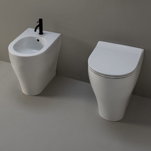 Bidet près du mur - AP214 - FLAMINIA - en céramique / pour personnes à mobilité réduite