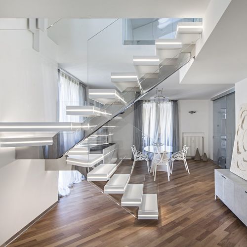 Escalier quart tournant - LUXO: SURFACE - Officine Sandrini - demi-tournant / structure en acier inoxydable / résidentiel
