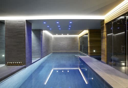 Piscine d'intérieur - GUNCAST SWIMMING POOLS - enterrée / en béton