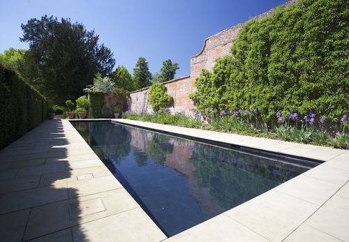 Piscine d'extérieur - LUXURY - GUNCAST SWIMMING POOLS - enterrée / en pierre