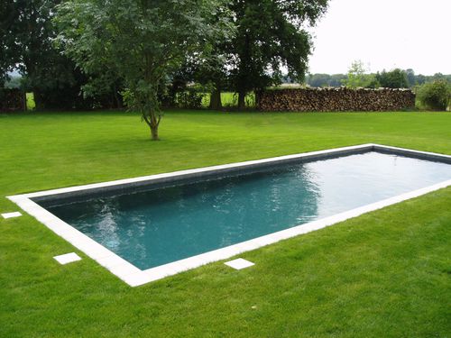 Piscine d'extérieur - UNIQUE - GUNCAST SWIMMING POOLS - enterrée / en béton