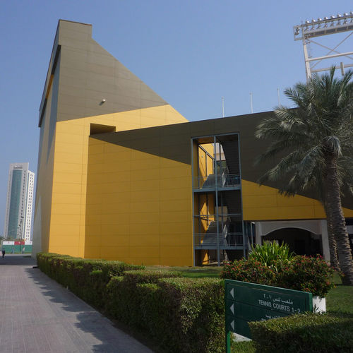 Bardage pour façade ventilée - FORMBOARD TOP PINE - TENNIS STADIUM DOHA - Bruag Design Factory AG - en panneaux / en fibre de bois / lisse