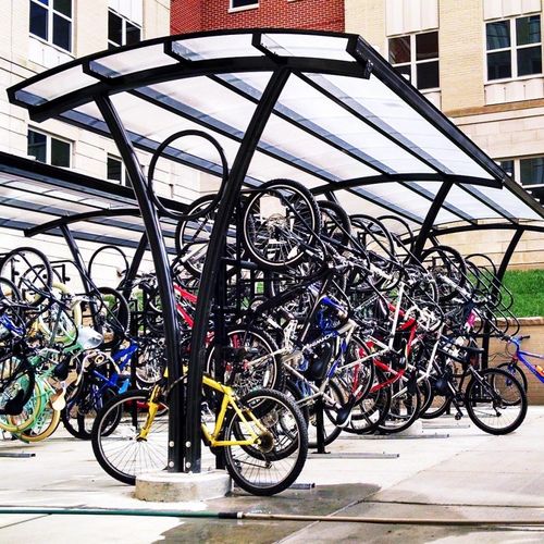 Abri vélo couverture en polycarbonate - AERO - Brasco International Inc. - en acier / en aluminium / pour espace public