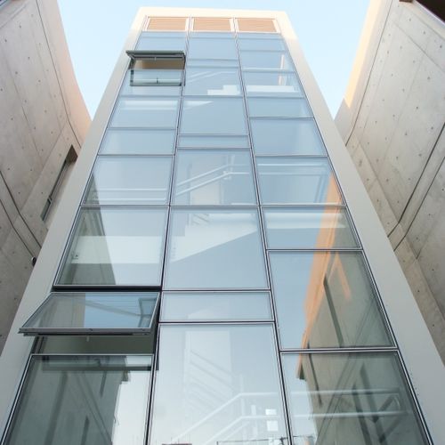 Mur-rideau en panneaux - EL 7000 - Elvial - en aluminium et en verre