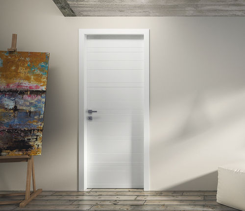 Porte d'intérieur - NIDIO - Flessya - en bois / battante / pleine