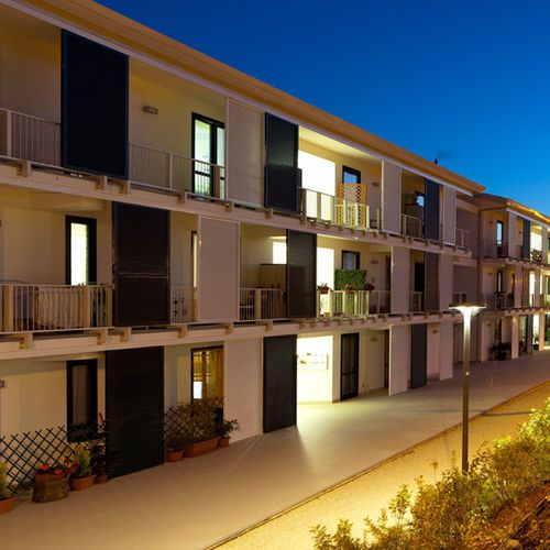 Brise-soleil en aluminium - Sypri - en bois / pour façade / rigide