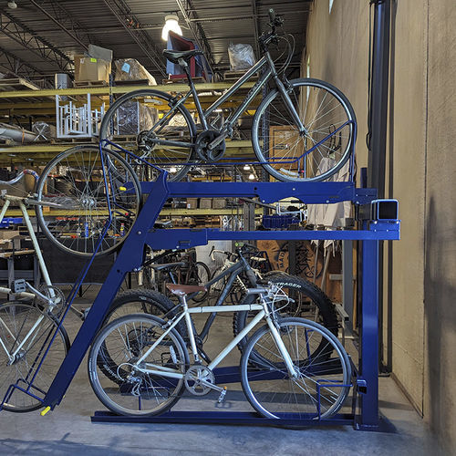 Range-vélo au sol - BIKE BOOST STORAGE - Madrax - en acier galvanisé / en acier à revêtement par poudre / sécurisé