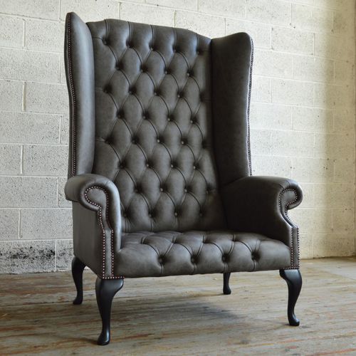 Fauteuil chesterfield - GRANDE BOSS  - Abode Sofas - en cuir / à oreilles / avec dossier haut