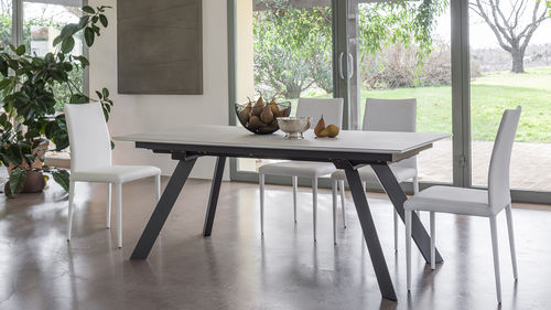 Table à manger contemporaine - TRINITY - altacom italia - en céramique / avec piètement en métal / rectangulaire