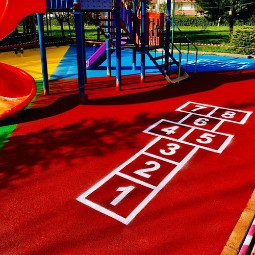 Revêtement de sol pour aire de jeux - UNICA - en PVC / en béton / en caoutchouc