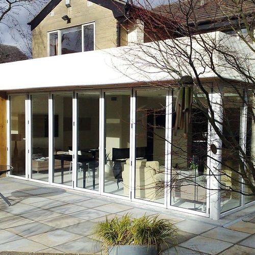 Porte d'entrée - Moving Designs Ltd - en bois / en aluminium / en PVC
