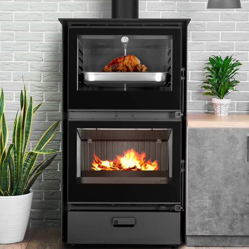 Poêle à bois - BAKE 70 - BELLIDO Manufacturas Metálicas, S.L. - 5 kW - 10 kW / sur pieds / contemporain