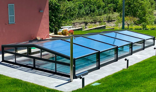 Abri de piscine bas - Tarraco - COVERTTO - télescopique / en polycarbonate / avec actionnement manuel
