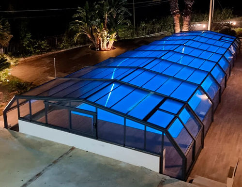 Abri de piscine bas - Itálica - COVERTTO - télescopique / en polycarbonate / motorisé