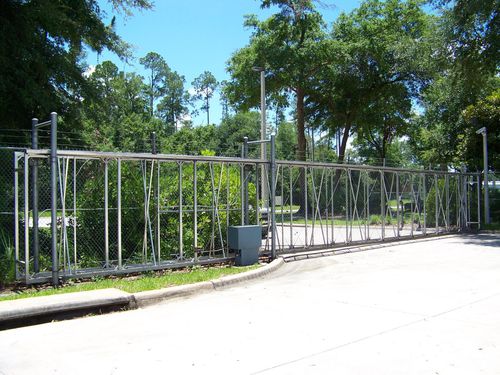 Portail coulissant - FORTRESS BOX FRAME - Tymetal Corp - alliage d'aluminium / grillagé / motorisé