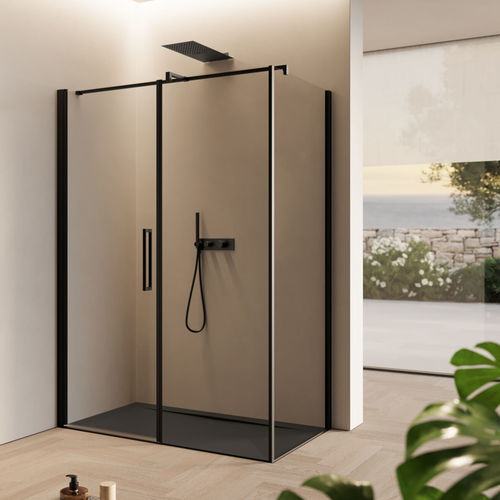 Cabine de douche en verre - OMEGA - Disenia - en aluminium / avec porte battante / d'angle