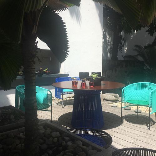 Table à manger contemporaine - CARIBE - ames - en acier / en plastique / ronde