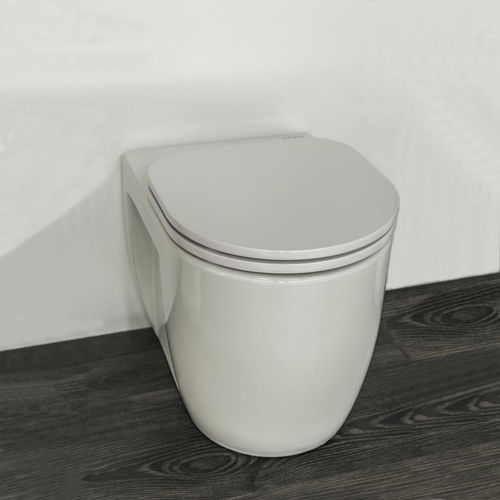 WC suspendu - JUNIOR - Valadares - en céramique / en inox / moderne