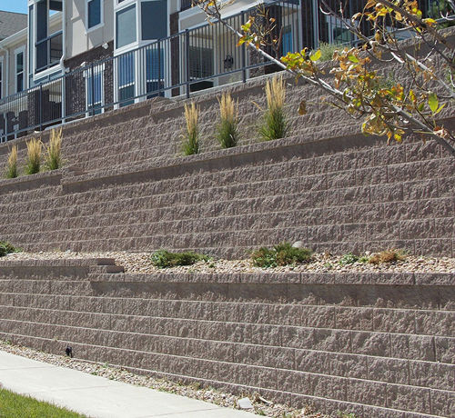 Bloc de béton creux - KEYSTONE COMPAC - PAVESTONE - pour mur de soutènement / emboîtable / aspect pierre