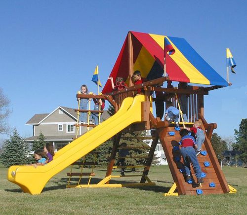 Structure de jeu pour aire de jeux - RAINBOW SUNSHINE CASTLE - GOLDEN GAMES SRL - pour collectivité / en bois / modulaire