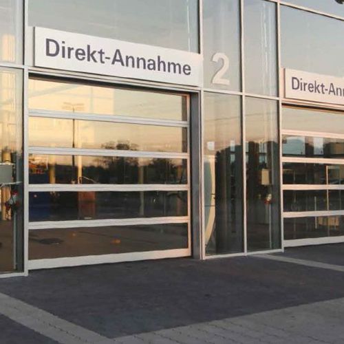 Porte industrielle sectionnelle - PANORAMA 40 | PANORAMA 60 - Promstahl - en aluminium / en Plexiglas® / automatique