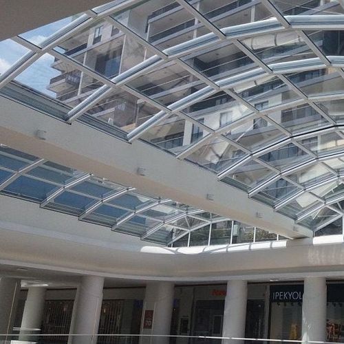 Toit vitré en aluminium - CLEARSKY - Evergreen Solutions - en acier / motorisé / à double vitrage