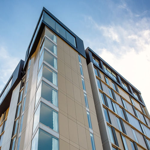 Bardage à cassettes - THE BAXTER INTERNATIONAL HOTEL - ALUCOBOND - en composite / en aluminium / en bronze