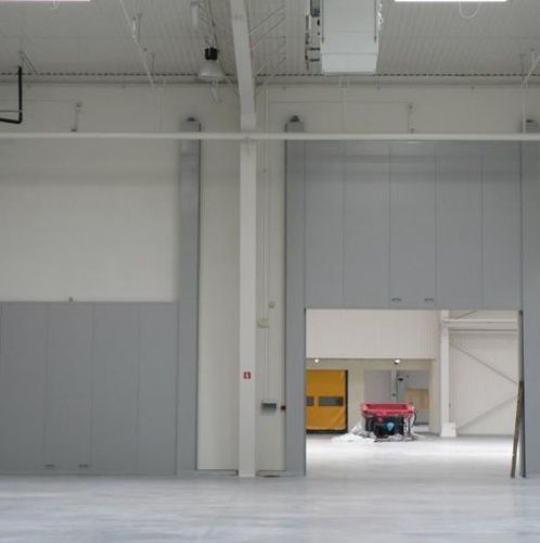 Porte industrielle coulissant-verticale - GATES - Gutkowski - en métal / automatique / de sécurité