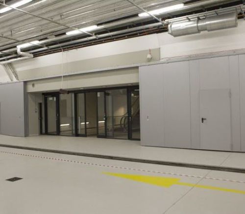 Porte industrielle coulissante - SIDEWAYS - Gutkowski - en métal / automatique / de sécurité