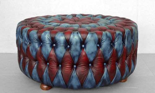 Ottoman chesterfield - Harleq - en cuir / rond / d'intérieur