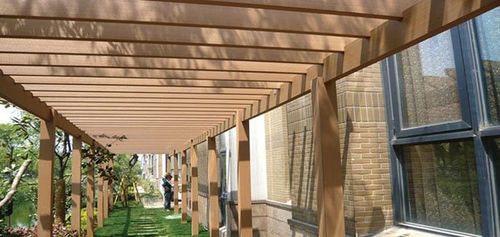 Pergola autoportée - TRADITIONAL - Protechwood International Limited - en bois composite / couverture en bois / professionnelle
