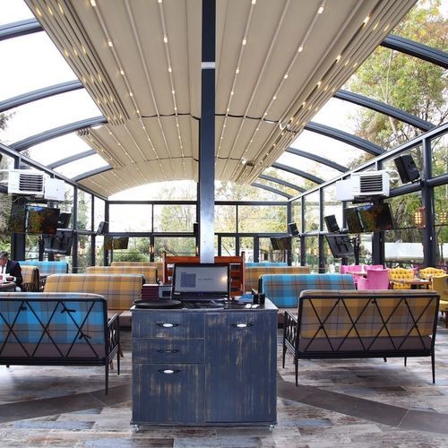 Pergola en arc autoportée - VISTA - Aluminante - en aluminium / couverture coulissante en toile PVC / motorisée