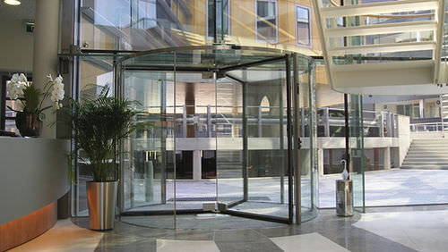 Porte d'entrée - CRYSTAL TOURNIKET (MANUAL) - Boon Edam - en verre / battante / vitrée