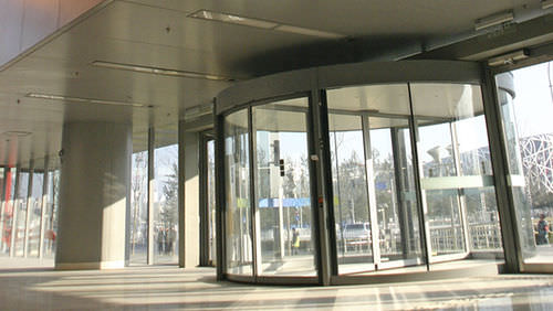 Porte d'entrée - DUOTOUR - Boon Edam - en verre / à tambour / vitrée