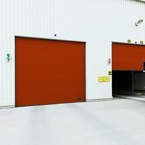 Porte industrielle sectionnelle - OH1042S  - ASSA ABLOY Entrance Systems - en tôle d'acier / automatique / résistante au vent