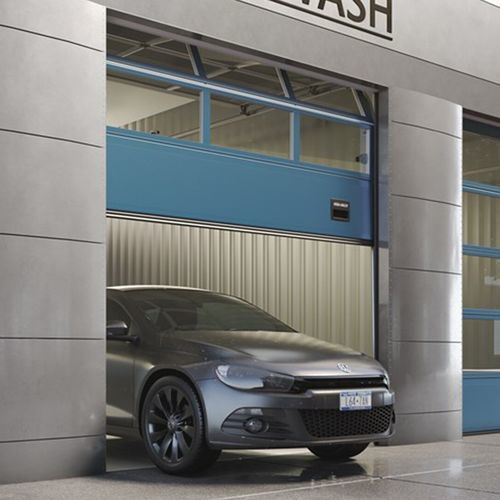 Porte industrielle sectionnelle - OH1042DD - ASSA ABLOY Entrance Systems - en tôle d'acier / automatique / de sécurité