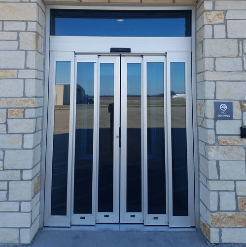 Système coulissant en métal - SL500 T67 - ASSA ABLOY Entrance Systems - pour porte en verre / coureurs cachés / pour établissement public