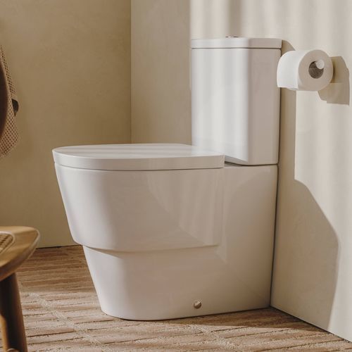 WC à poser - TURA - ROCA - en céramique / résidentiel / rond