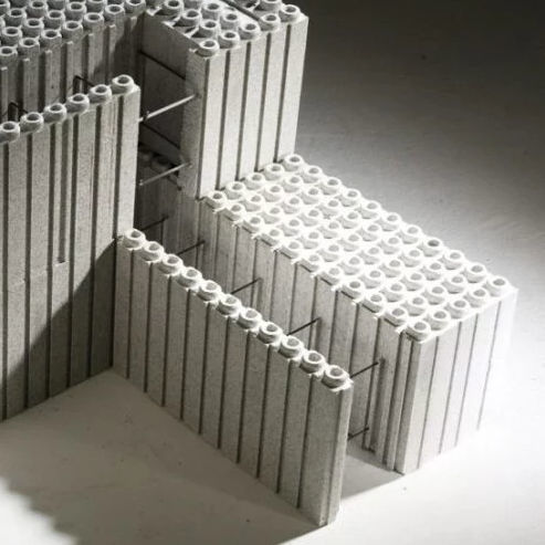 Bloc coffrant en béton - SÉRIE 100 - EUROMAC2 - en polystyrène / pour mur / pour maison passive