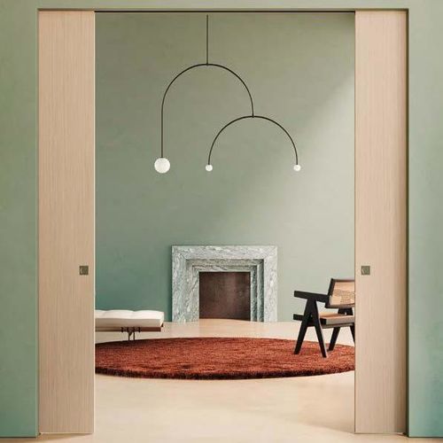Porte d'intérieur - FLUA - SCRIGNO - en bois / en stratifié / coulissante
