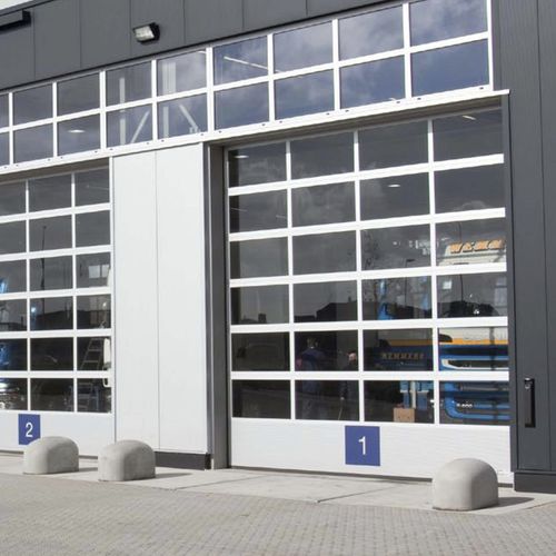 Porte industrielle sectionnelle - NovoLux  - Novoferm - en aluminium / en acrylique / acoustique