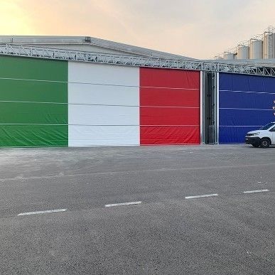 Porte industrielle sectionnelle latérale - SPEEDY  - Moreschi Chiusure Industriali S.r.l. - en acier / en PVC / en tissu