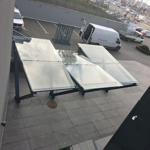 Auvent d'entrée - Transparent Design SRL - en inox / en verre / plat