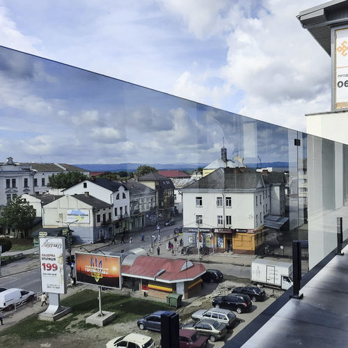 Garde-corps en verre - PARITET LLC - à panneaux / en tôle perforée / de type balustrade
